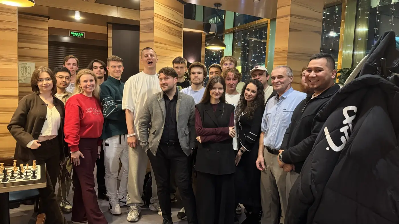 Group photo of the chess tournament players at Coffee Bean, Moscow City