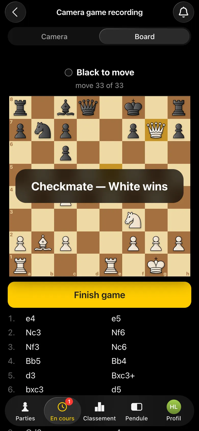 « Checkmate — White wins » sur l’échiquier, « move 33 of 33 »